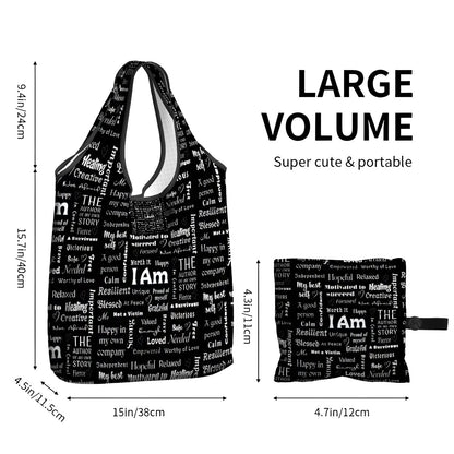 Black I Am folding shopper bag with white motivational text, pocket pouch, and size dimensions shown