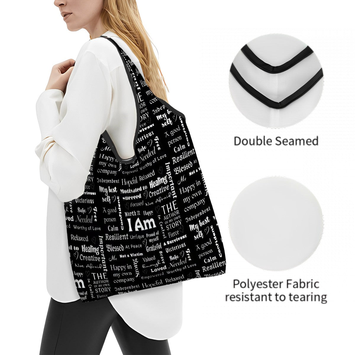 Woman carrying black folding shopper bag with white motivational text, double seamed, polyester fabric