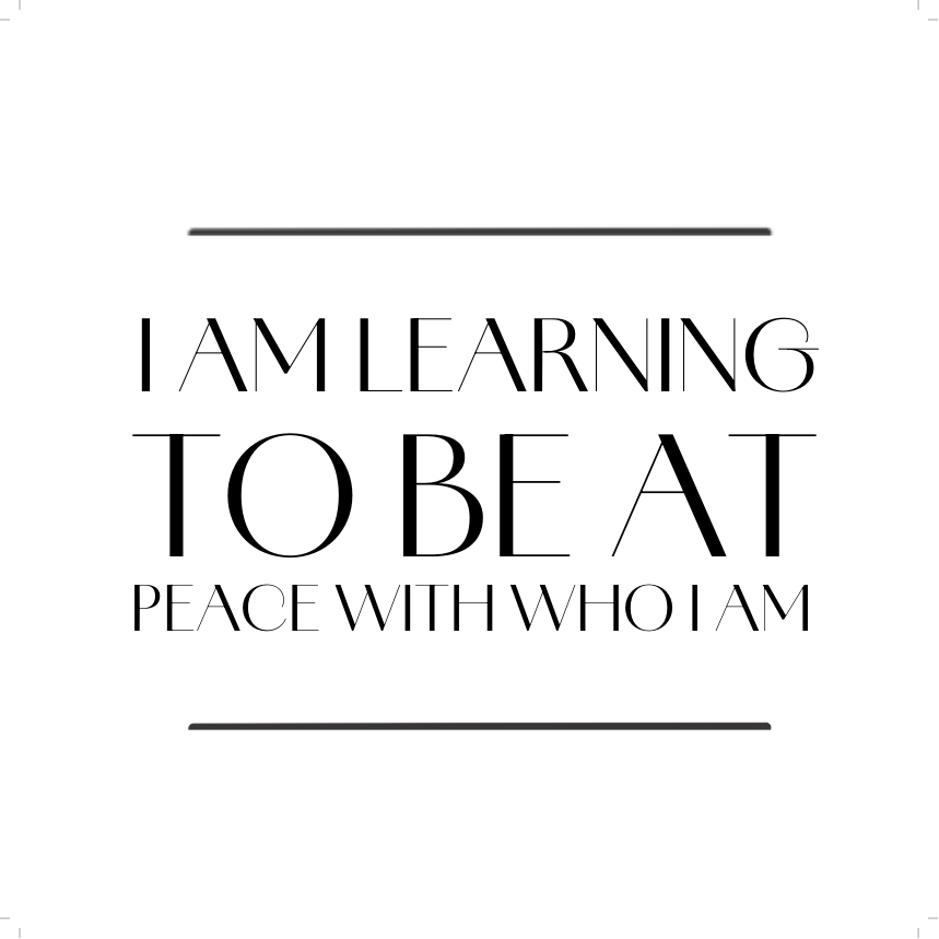 Motivational quote 'I am learning to be at peace with who I am' on a white background