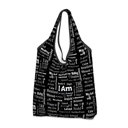 Black folding shopper bag with white motivational words and phrases in various fonts